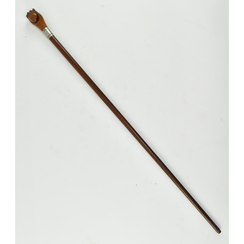 135 - A 19th century Victorian turned malacca and mahogany walking stick cane. The walking stick featuring... 