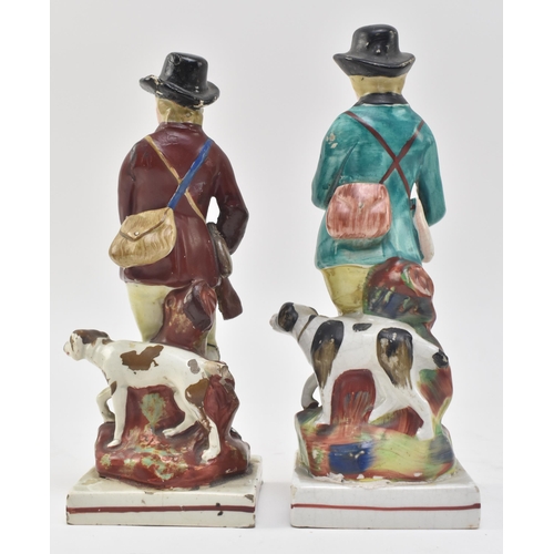 137 - A pair of early 19th century Staffordshire pearlware figurines of huntsman. Each figure complete wit... 