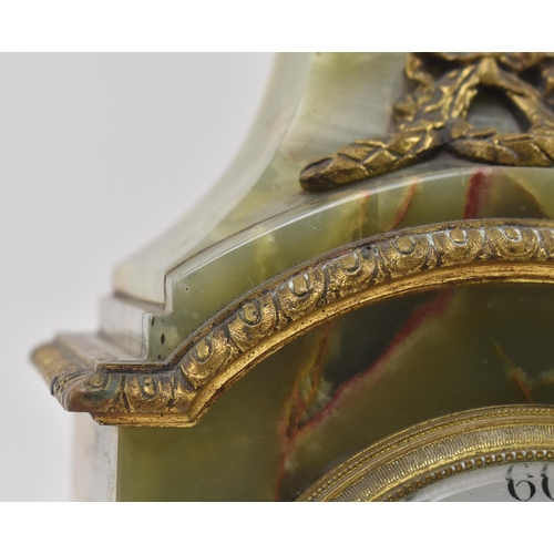 140 - A French continental early 20th century green onyx & brass mounted eight-day mantle clock. The c... 