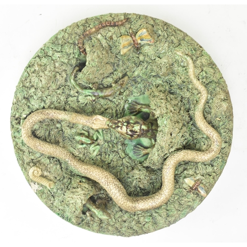 141 - An early 20th century Portuguese Palissy ware grotesque majolica charger plate by Jose a Cunha. The ... 