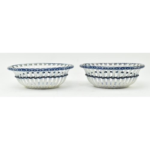 143 - Caughley - a pair of late 18th century Regency blue and white Chinoiserie dishes with lattice work d... 