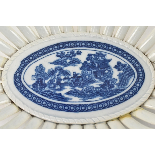 143 - Caughley - a pair of late 18th century Regency blue and white Chinoiserie dishes with lattice work d... 