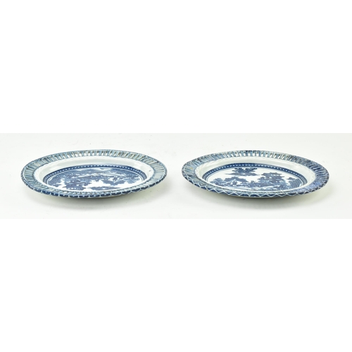 143 - Caughley - a pair of late 18th century Regency blue and white Chinoiserie dishes with lattice work d... 