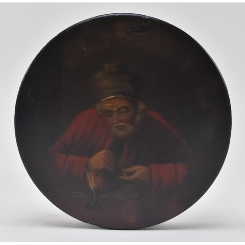 144 - A late 18th - early 19th century hand painted papier mache lacquered snuff box. The circular box pai... 