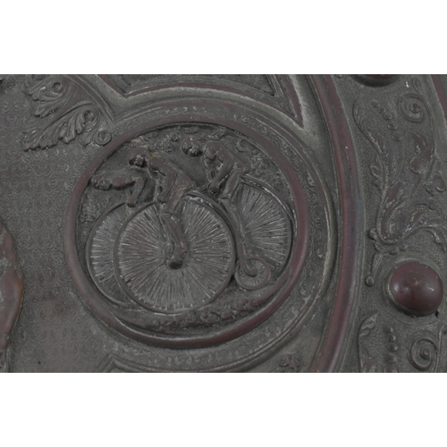 154 - A Victorian 19th century copper commemorative trophy plaque. The circular plaque having in relief de... 