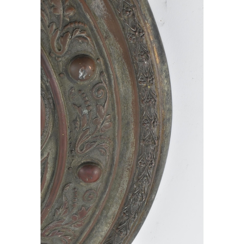 154 - A Victorian 19th century copper commemorative trophy plaque. The circular plaque having in relief de... 