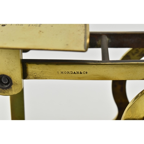 162 - S. Mordan & Co, London - A pair of early 20th century brass & oak wood postal scales. Each w... 