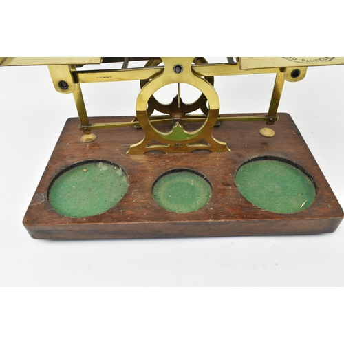 162 - S. Mordan & Co, London - A pair of early 20th century brass & oak wood postal scales. Each w... 