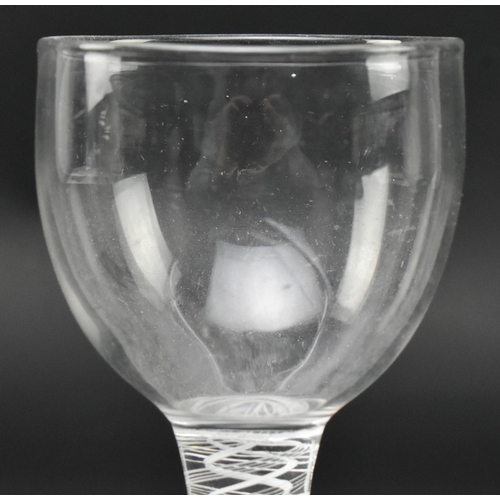 17 - A George II mid 18th century circa 1760 crystal double opaque twist wine goblet glass. Wide rounded ... 