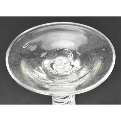 17 - A George II mid 18th century circa 1760 crystal double opaque twist wine goblet glass. Wide rounded ... 