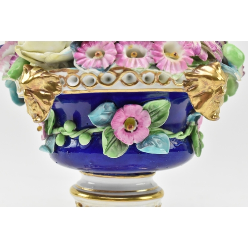 175 - Royal Crown Derby - an early 19th century hand painted porcelain urn. The urn containing relief encr... 