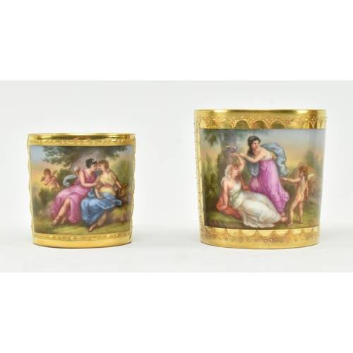 180 - Two early 19th century Royal Vienna style hand painted porcelain teacups. The lot comprising a coffe... 