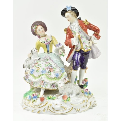 182 - An early 20th century Sitzendorf German porcelain figurine of a courting Regency couple. The gent de... 