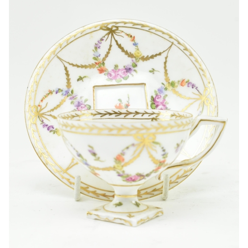 185 - A 19th century continental Dresden marked hand painted porcelain teacup & saucer. Each decorated... 