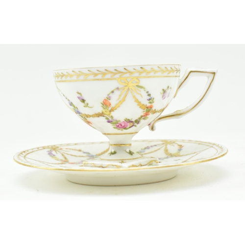 185 - A 19th century continental Dresden marked hand painted porcelain teacup & saucer. Each decorated... 