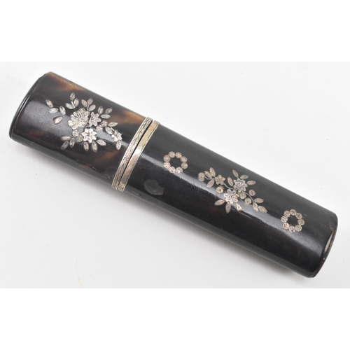 186 - An early 19th century George III tortoiseshell pique inlaid bodkin etui case. The case of a tapering... 