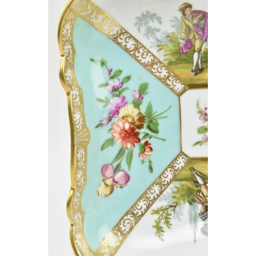 189 - An early 19th century continental hand painted porcelain squared platter. The platter with gilt scro... 