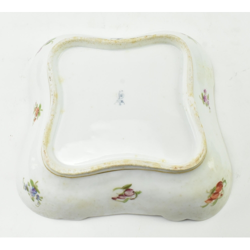 189 - An early 19th century continental hand painted porcelain squared platter. The platter with gilt scro... 