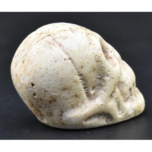 19 - A circa 18th century hand carved soft stone Memento Mori mourning skull pocket trinket. The skull na... 