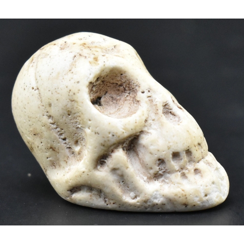 19 - A circa 18th century hand carved soft stone Memento Mori mourning skull pocket trinket. The skull na... 