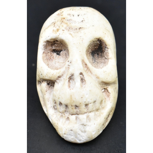 19 - A circa 18th century hand carved soft stone Memento Mori mourning skull pocket trinket. The skull na... 