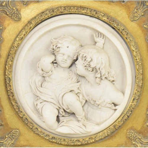 190 - After Enrico Braga (Italian, 1841-1919) - A pair of reconstituted marble decorative wall plaques in ... 