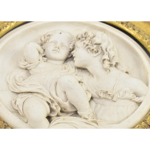 190 - After Enrico Braga (Italian, 1841-1919) - A pair of reconstituted marble decorative wall plaques in ... 