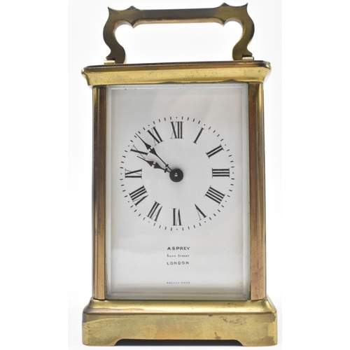 23 - Asprey, London - an early 20th century glass & brass French made carriage clock in original leat... 