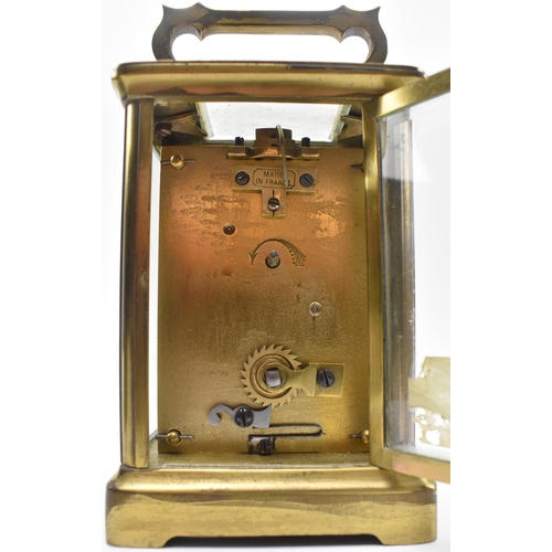 23 - Asprey, London - an early 20th century glass & brass French made carriage clock in original leat... 