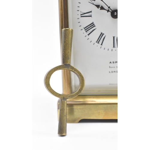 23 - Asprey, London - an early 20th century glass & brass French made carriage clock in original leat... 