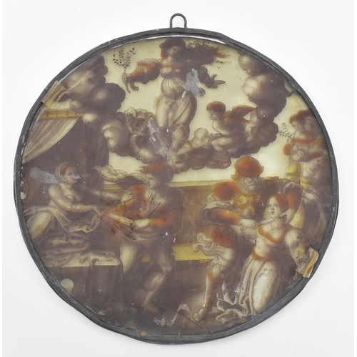 26 - An early 19th century circular lead glass panel, hand painted to feature mythological scenes. In amb... 