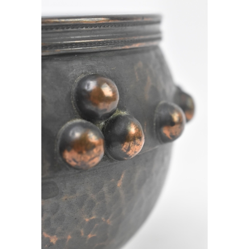 29 - J. Gillmore, Glastonbury - a 20th century Arts & Crafts hammered copper bowl on stand. Globular ... 