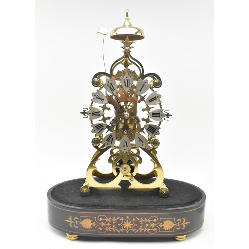 31 - An early 20th century brass single fusee movement skeleton mantel clock in glass dome. The clock hav... 