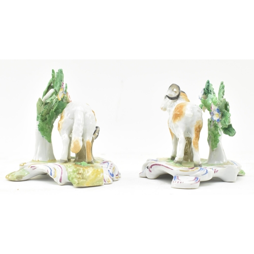 34 - Chelsea Porcelain - a pair of 18th century hand painted porcelain figures of rams. Each having an in... 