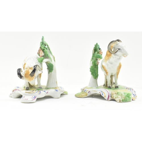 34 - Chelsea Porcelain - a pair of 18th century hand painted porcelain figures of rams. Each having an in... 