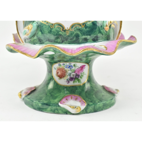 38 - An early 19th century Regency porcelain lidded frill vase & cover. The vase of green ground, dom... 