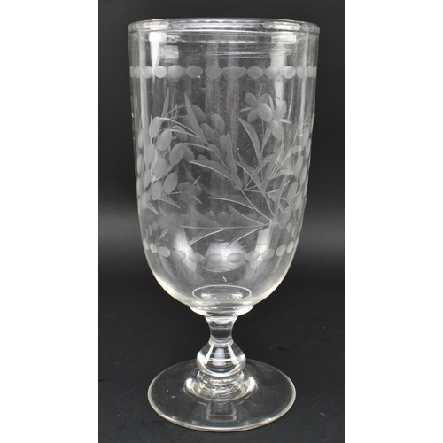 48 - A Victorian early 19th century hand etched cut glass celery vase. The glass having an etched rim ove... 