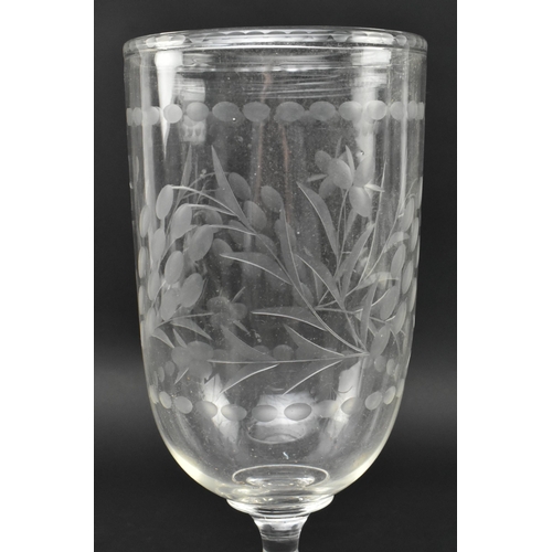 48 - A Victorian early 19th century hand etched cut glass celery vase. The glass having an etched rim ove... 