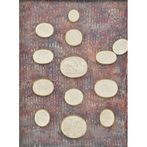 50 - A collection of twenty-six 19th century Italian Grand Tour plaster casts cameo roundels after intagl... 