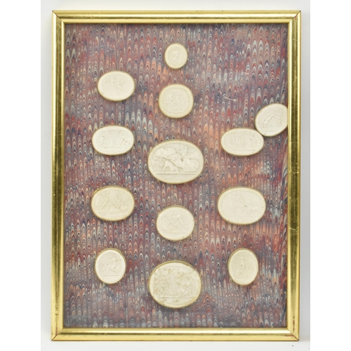 50 - A collection of twenty-six 19th century Italian Grand Tour plaster casts cameo roundels after intagl... 