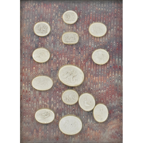 50 - A collection of twenty-six 19th century Italian Grand Tour plaster casts cameo roundels after intagl... 