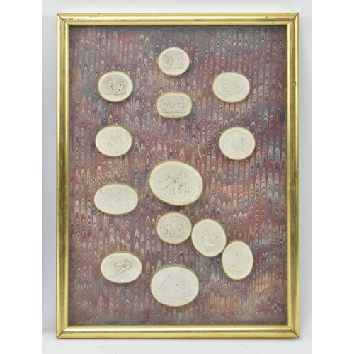 50 - A collection of twenty-six 19th century Italian Grand Tour plaster casts cameo roundels after intagl... 