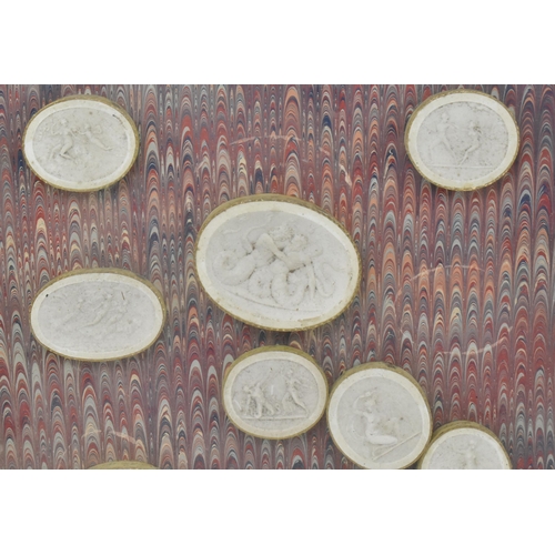 50 - A collection of twenty-six 19th century Italian Grand Tour plaster casts cameo roundels after intagl... 