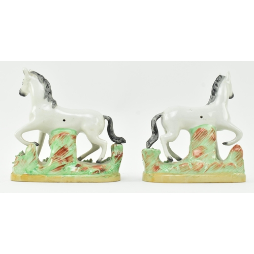 54 - A collection of eight Victorian 19th century Staffordshire hand painted porcelain figures of zebras.... 