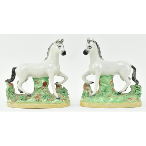 54 - A collection of eight Victorian 19th century Staffordshire hand painted porcelain figures of zebras.... 