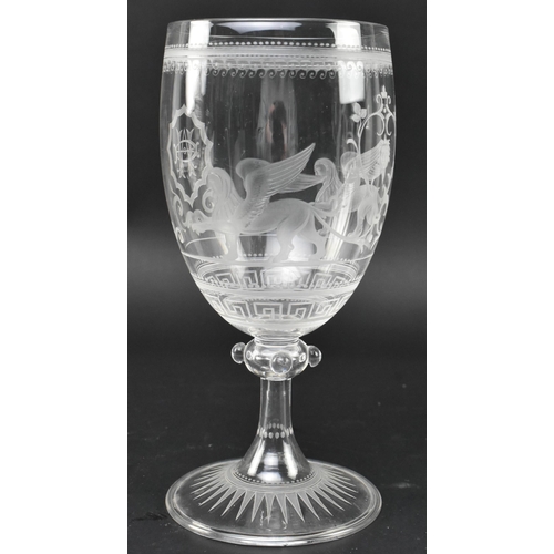 55 - A mid 19th century Victorian engraved wine glass chalice. The goblet featuring beaded & swirled ... 