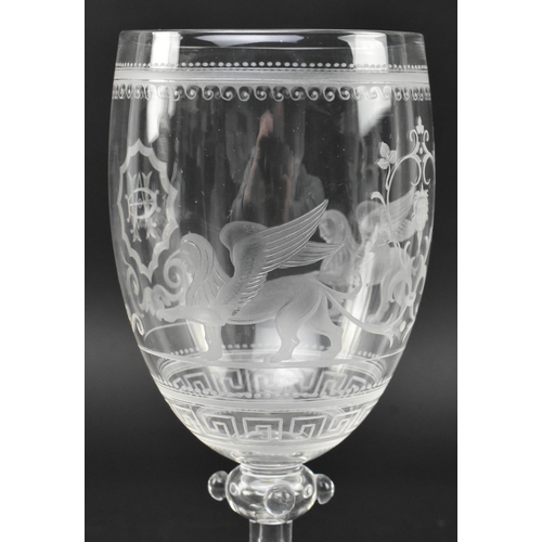 55 - A mid 19th century Victorian engraved wine glass chalice. The goblet featuring beaded & swirled ... 