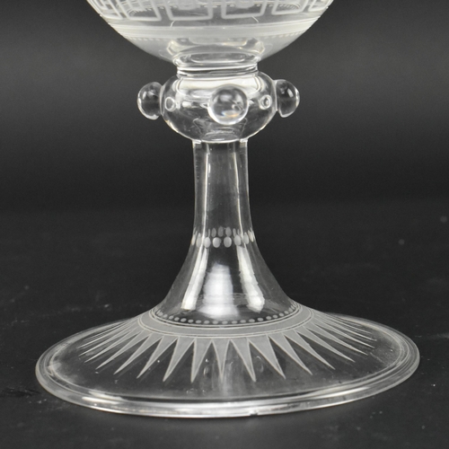 55 - A mid 19th century Victorian engraved wine glass chalice. The goblet featuring beaded & swirled ... 