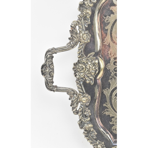 64 - A large late 19th / early 20th century High Victorian silver plated ornate serving tray. The tray ha... 