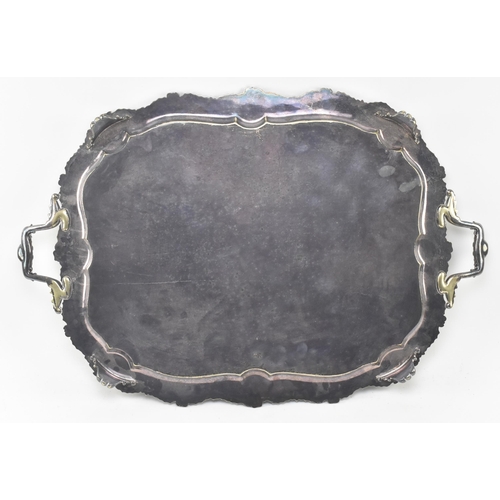 64 - A large late 19th / early 20th century High Victorian silver plated ornate serving tray. The tray ha... 